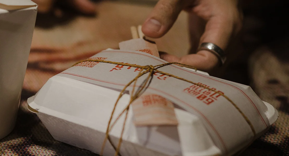 New Heng Kee packaging detail — circular design inspired by Chinese trading era